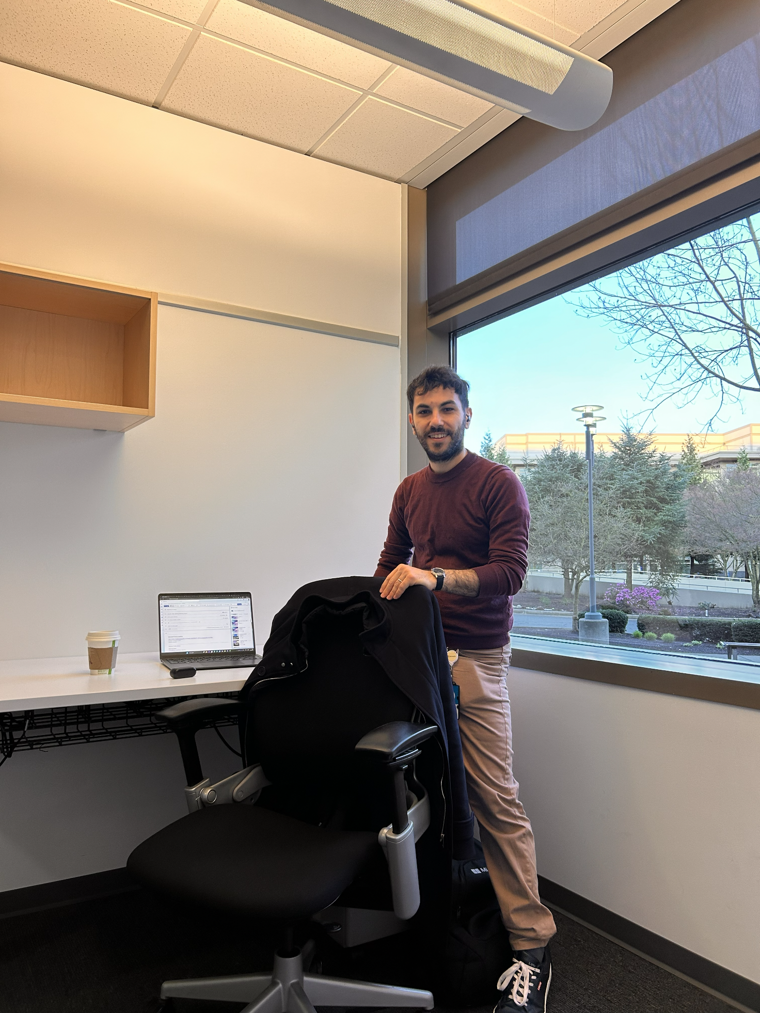 Francesco Valerio Buccoli standing in an office